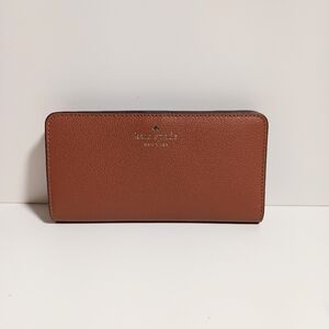 Kate Spade Bailey Large Pebble Leather Slim Bifold Wallet Warm Gingerbread K9754
